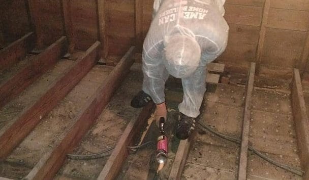 Spray Foam Insulation Technician installing floor insulation