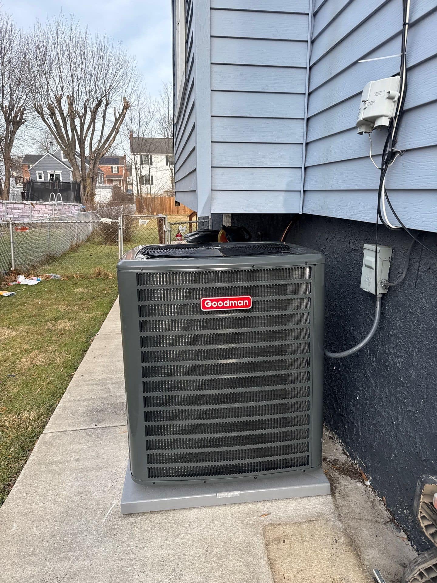 Goodman HVAC unit on concrete pad