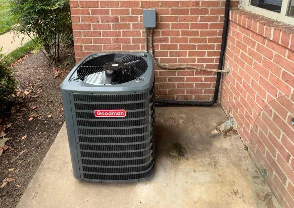HVAC technician performing air conditioner repair in Baltimore home