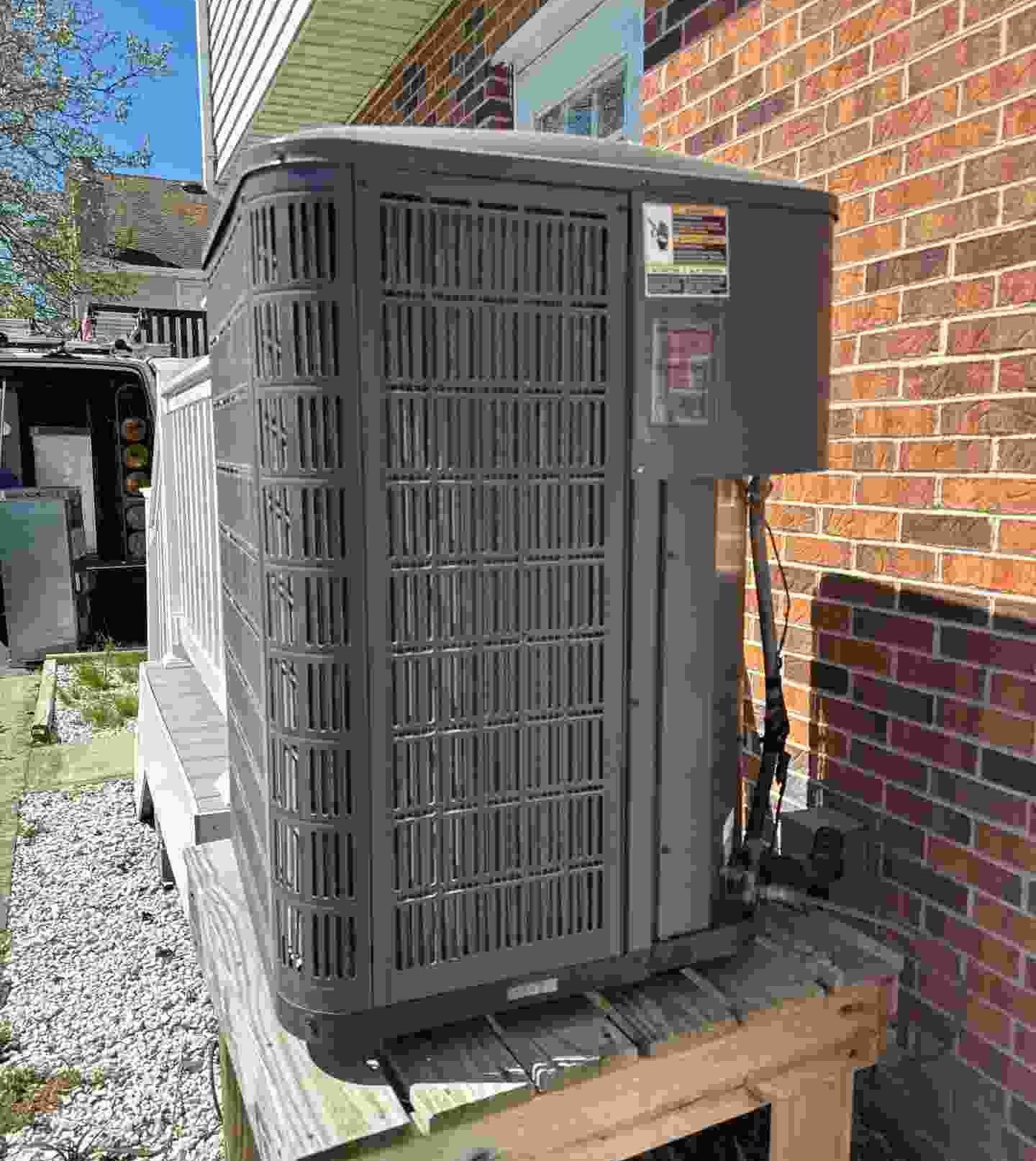 HVAC technician servicing an air conditioner in a Baltimore home