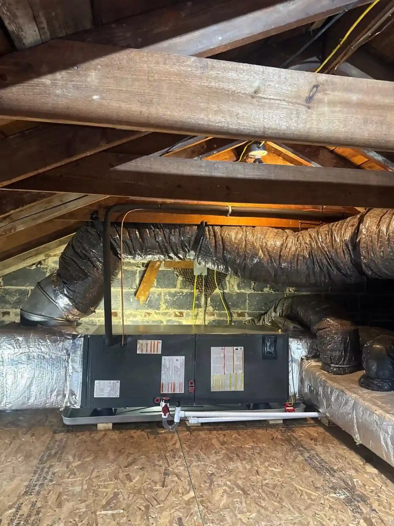 Blog Family adjusting thermostat in Baltimore home to reduce energy bills
